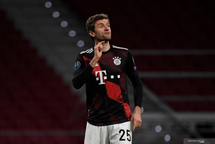 Liga Champions, gol penalti Thomas Mueller hambat laju Atletico ke fase gugur
