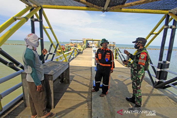 Sosialisasi protokol kesehatan di objek wisata 