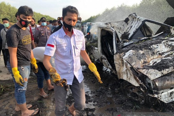 Tulang manusia di mobil yang terendam di kanal teridentifikasi