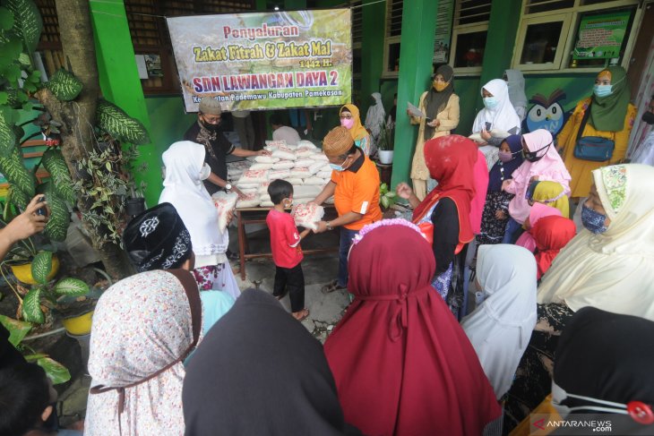 Salurkan Zakat Fitrah