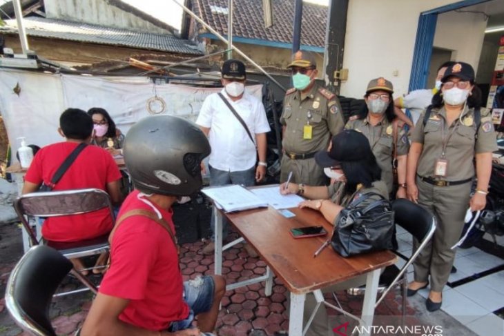 Tim Yustisi Denpasar denda 10 pelanggar prokes saat PPKM