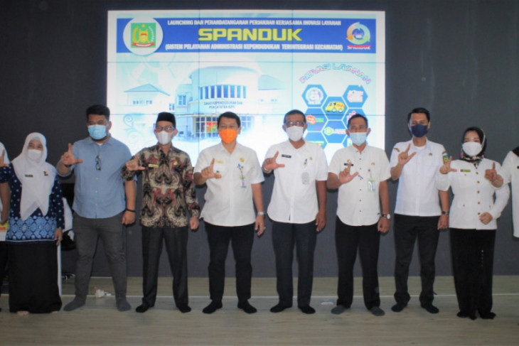 Sekda Langkat Launching Spanduk Disdukcapil