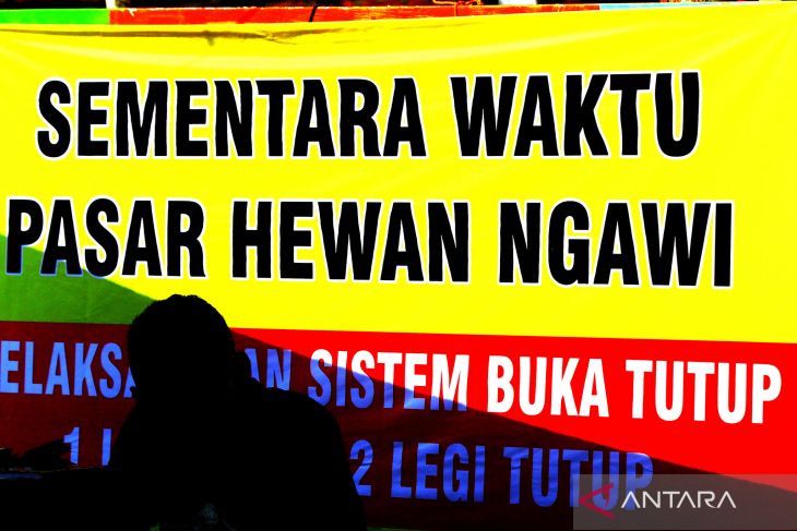 SISTEM BUKA TUTUP PASAR HEWAN NGAWI