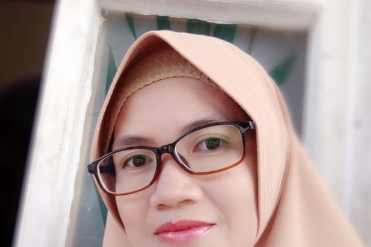 Zakiah, guru SMA Negeri 1 Puruk Cahu Kabupaten Murung Raya