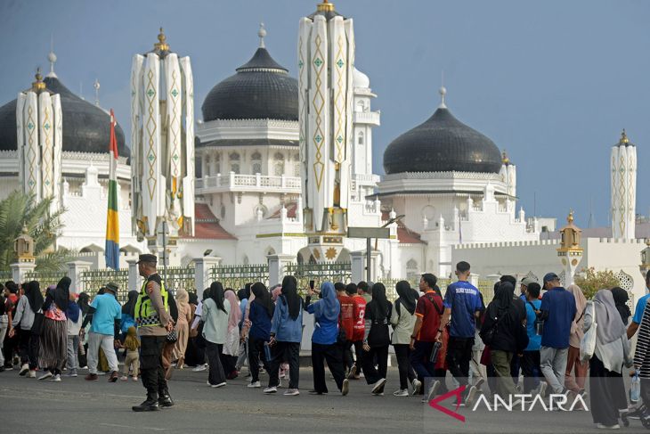 FOTO - Syar'i dan modist fun walk Muharram Raya