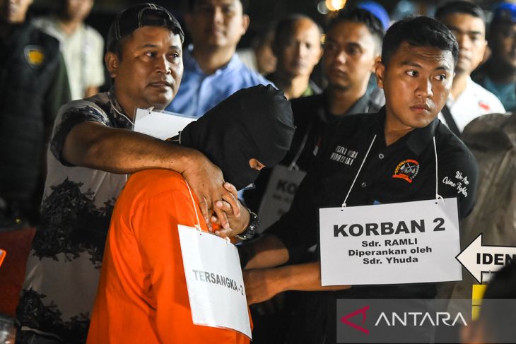 Rekonstruksi kasus penembakan bos rental mobil di Tangerang