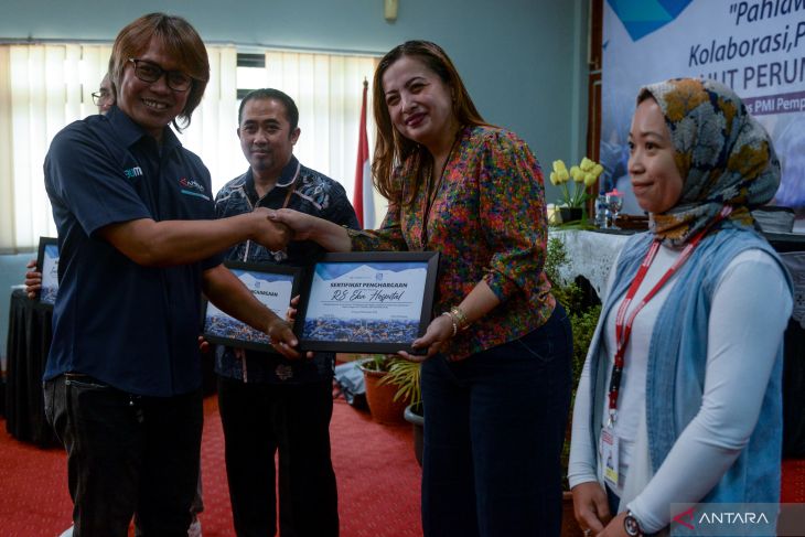 Bakti sosial dan pelatihan bantuan hidup untuk ojol