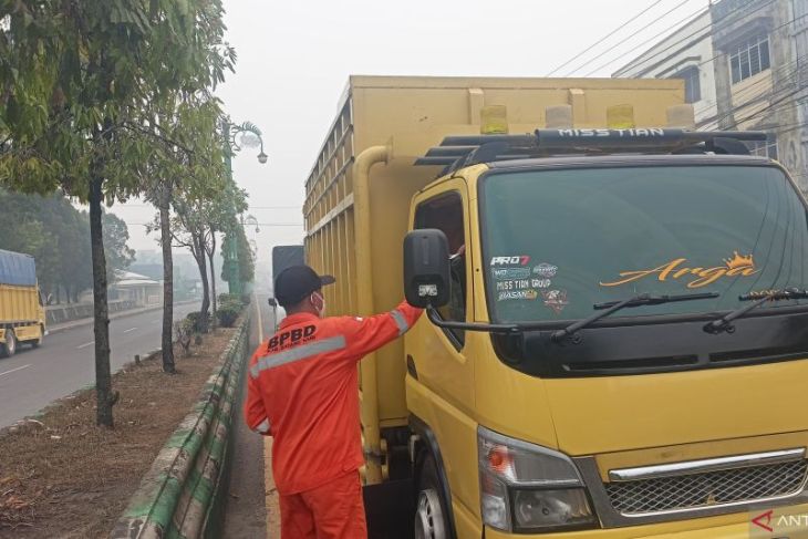 Pemkab Batang Hari bagikan 3.000 masker kepada pengendara