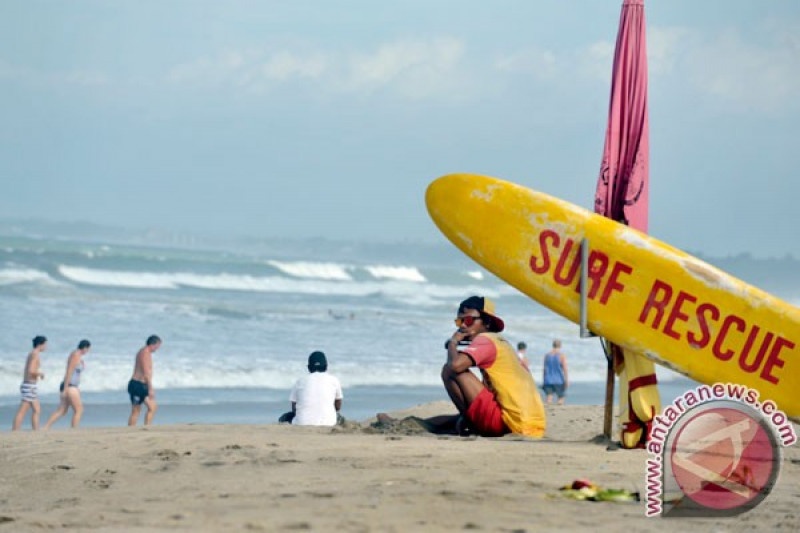 Chinese Tourist on the Beach