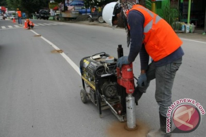 PERBAIKAN JALAN TRANS SULAWESI