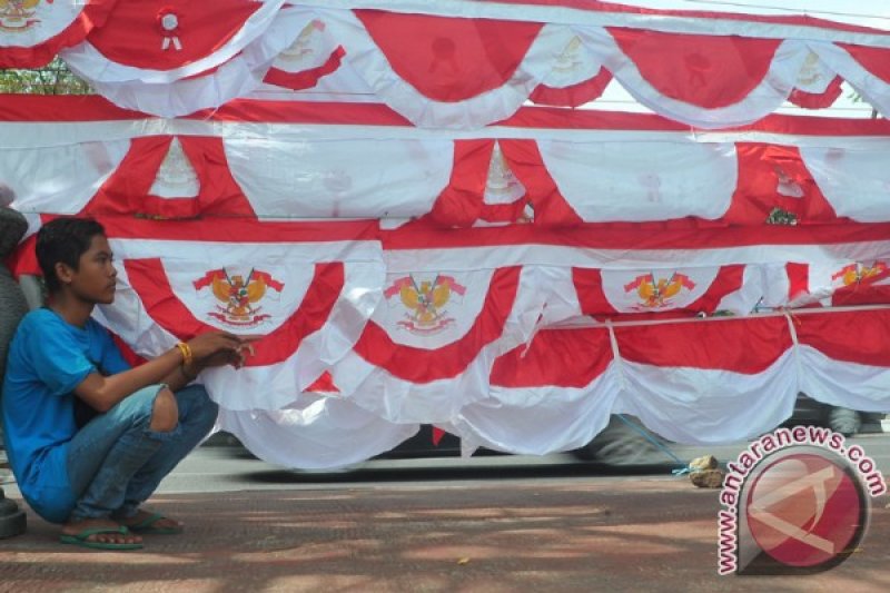 Penjual bendera datangan