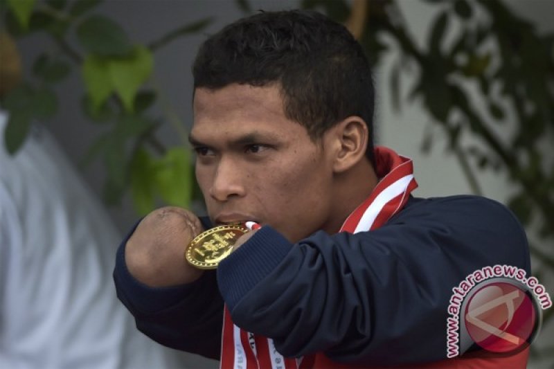 Miswan Atlet Sekaligus Penjahit Keluarga Presiden Jokowi