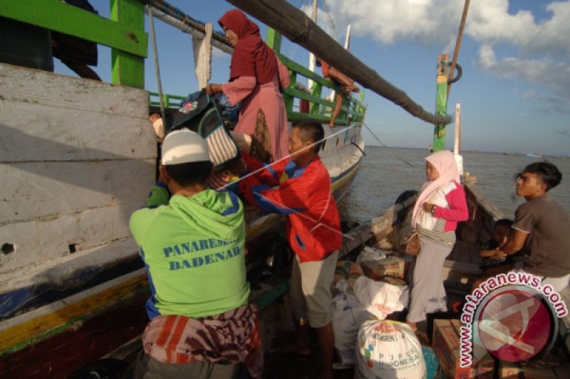 MUDIK DENGAN PERAHU