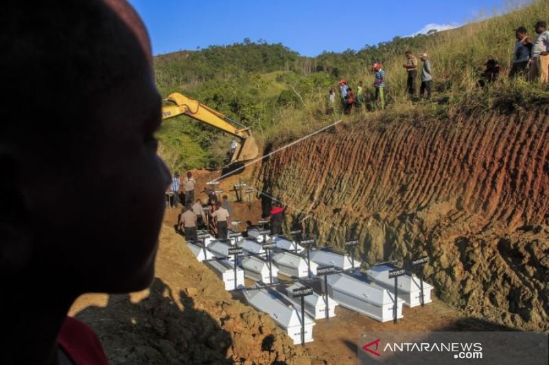 PEMAKAMAN MASSAL KORBAN BANJIR BANDANG SENTANI