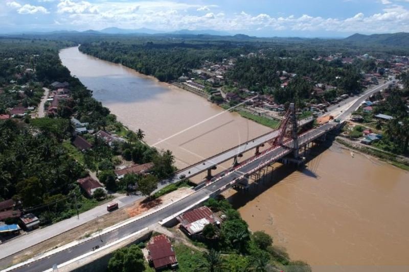 PERBAIKAN INFRASTRUKTUR JALAN LINTAS SUMATERA