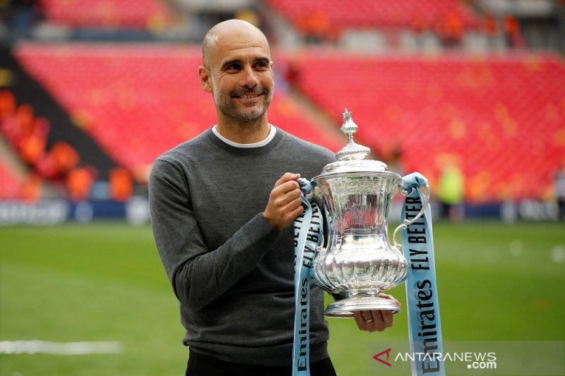 Guardiola tetap tagih peningkatan City musim depan meski raih trigelar