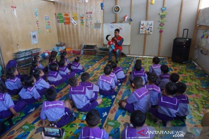 Pemulihan psikologi anak korban bencana melalui dongeng