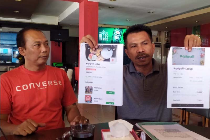 Pemilik kedai kopi gugat Grab karena akun fiktif