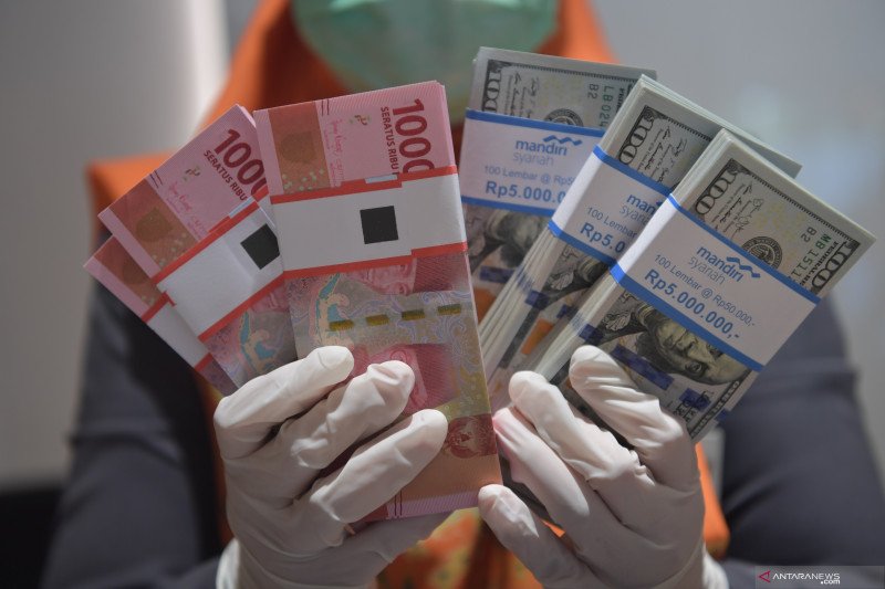 Rupiah Senin pagi menguat 74 poin menjadi Rp14.059 per dolar AS