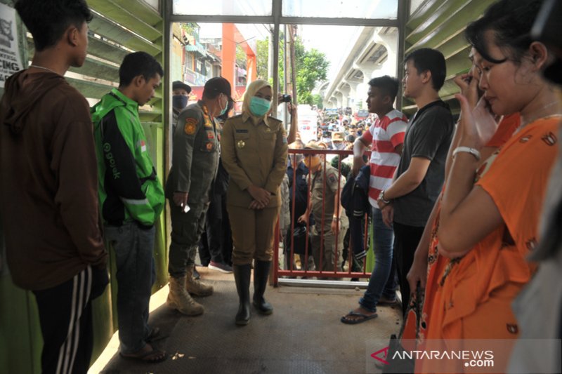 Sepuluh warga terjaring razia masker di Pasar Palima