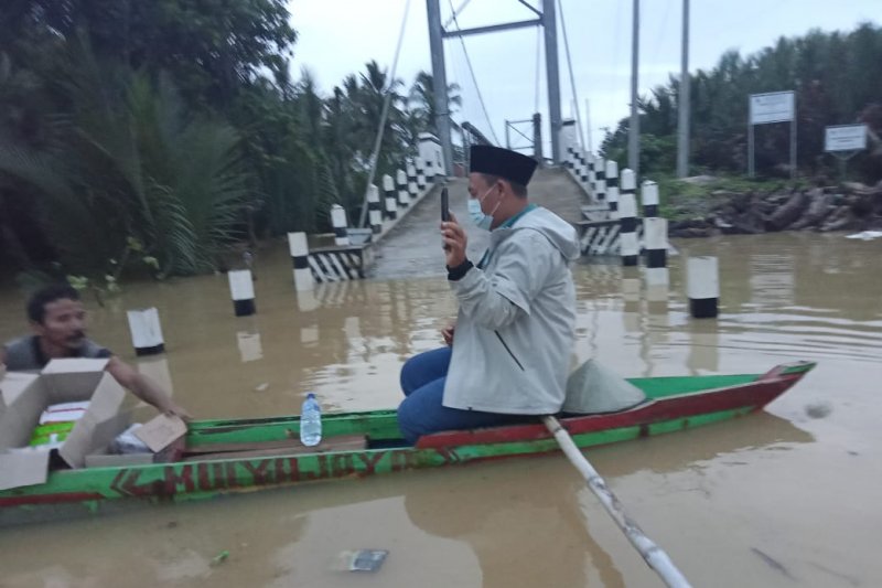 Kemarin, hujan lebat di Indonesia sampai penambahan kasus COVID-19