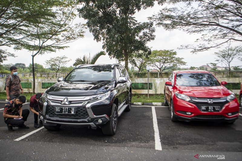 Dua Mobil Milik Tersangka Masjid Raya Srwiwijaya Eddy Hermanto Disita Kejati Sumsel