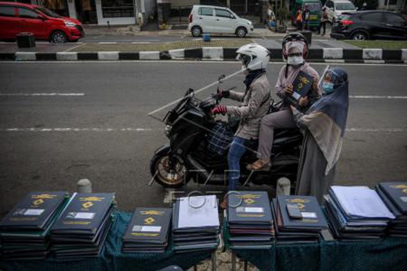 Pembagian rapor tanpa turun kendaraan