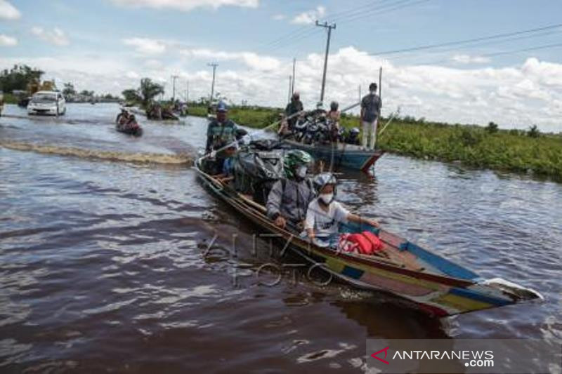 Banjir luapan Sungai Kahayan Dijalur Nasional Kalimantan