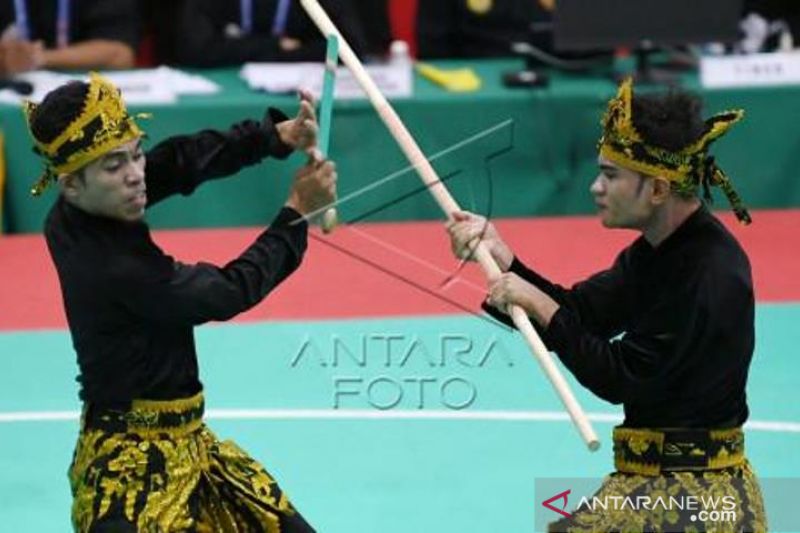 PON Papua:  Pesilat Ganda Putra Seni Papua Rebut Emas