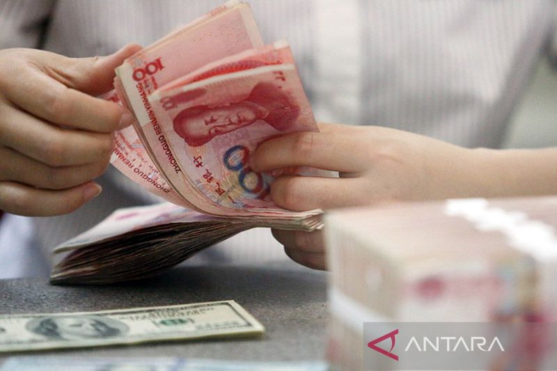Yuan terangkat 77 basis poin menjadi 7,1489 terhadap dolar AS