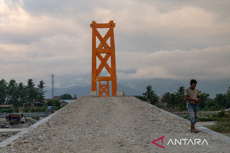 Pembangunan kembali jembatan gantung Sunju