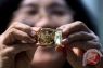 Harga emas Antam hari ini 3 Maret 2026 turun Rp13.000 jadi Rp3,122 juta per gram