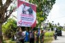 Polres Aceh Utara Sebarkan Spanduk Ajak Warga Gunakan Hak Pilih