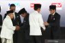 Makna konsistensi gaya berbusana Jokowi-Ma'ruf dan Prabowo-Sandiaga