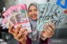 Kamis pagi rupiah melemah menjadi Rp18.075 per dolar AS